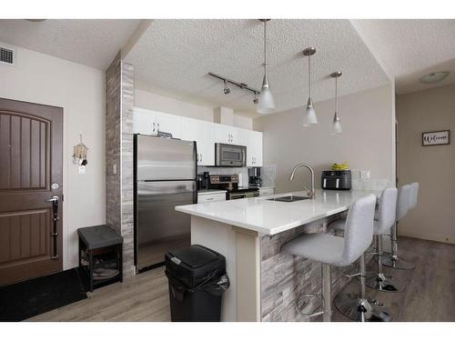 412-136B Sandpiper Road, Fort Mcmurray, AB - Indoor Photo Showing Kitchen With Double Sink With Upgraded Kitchen