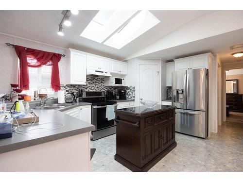 165 Mitchell Drive, Fort Mcmurray, AB - Indoor Photo Showing Kitchen With Stainless Steel Kitchen With Double Sink