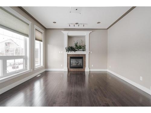 276 Sandpiper Road, Fort Mcmurray, AB - Indoor Photo Showing Living Room With Fireplace