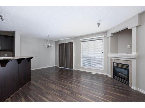 189 Sandstone Lane, Fort Mcmurray, AB - Indoor Photo Showing Living Room With Fireplace