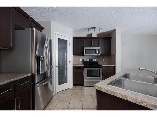 189 Sandstone Lane, Fort Mcmurray, AB - Indoor Photo Showing Kitchen With Double Sink