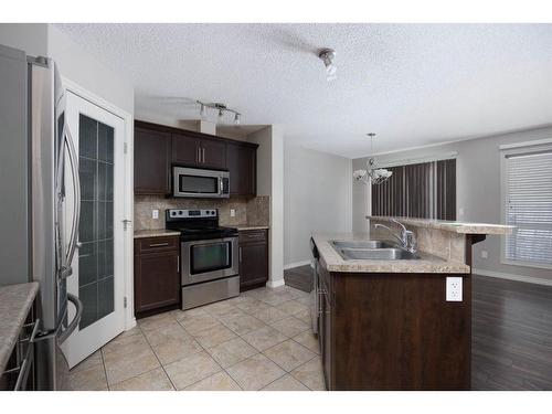 189 Sandstone Lane, Fort Mcmurray, AB - Indoor Photo Showing Kitchen With Double Sink