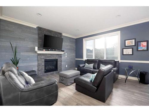 136 Gravelstone Road, Fort Mcmurray, AB - Indoor Photo Showing Living Room With Fireplace