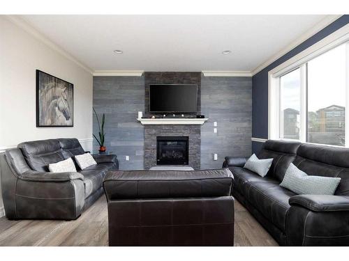 136 Gravelstone Road, Fort Mcmurray, AB - Indoor Photo Showing Living Room With Fireplace