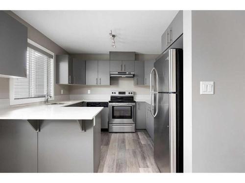 57-401 Athabasca Avenue, Fort Mcmurray, AB - Indoor Photo Showing Kitchen With Stainless Steel Kitchen With Upgraded Kitchen