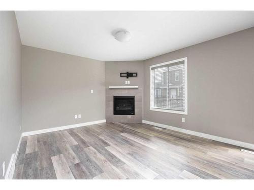 57-401 Athabasca Avenue, Fort Mcmurray, AB - Indoor Photo Showing Living Room With Fireplace