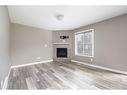 57-401 Athabasca Avenue, Fort Mcmurray, AB  - Indoor Photo Showing Living Room With Fireplace 