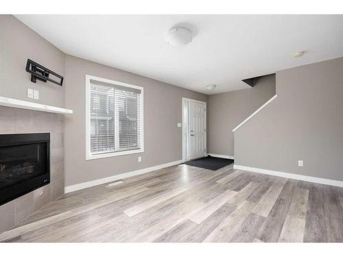 57-401 Athabasca Avenue, Fort Mcmurray, AB - Indoor Photo Showing Other Room With Fireplace