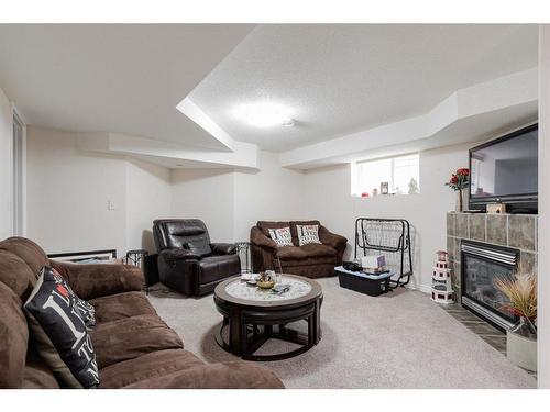 160 O'Coffey Crescent, Fort Mcmurray, AB - Indoor Photo Showing Other Room With Fireplace