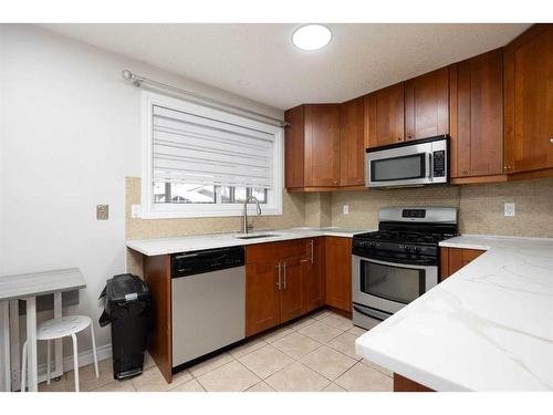 110 Ross Street, Fort Mcmurray, AB - Indoor Photo Showing Kitchen