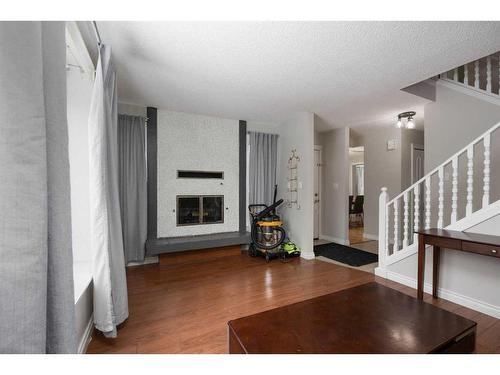 110 Ross Street, Fort Mcmurray, AB - Indoor Photo Showing Other Room With Fireplace