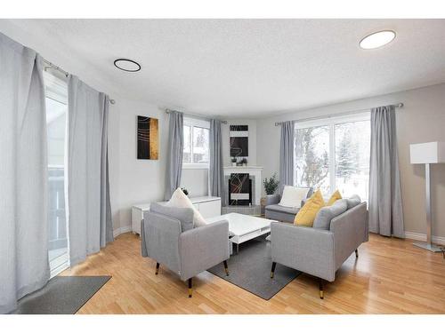 110 Ross Street, Fort Mcmurray, AB - Indoor Photo Showing Living Room With Fireplace