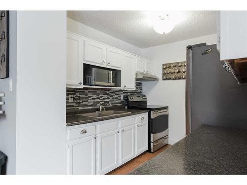 197 Ross Haven Drive, Fort Mcmurray, AB - Indoor Photo Showing Kitchen With Double Sink