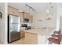 2115-204 Sparrow Hawk Drive, Fort Mcmurray, AB  - Indoor Photo Showing Kitchen With Stainless Steel Kitchen With Upgraded Kitchen 