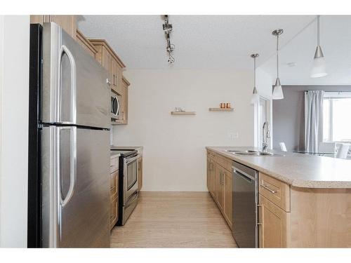 2115-204 Sparrow Hawk Drive, Fort Mcmurray, AB - Indoor Photo Showing Kitchen With Stainless Steel Kitchen With Double Sink