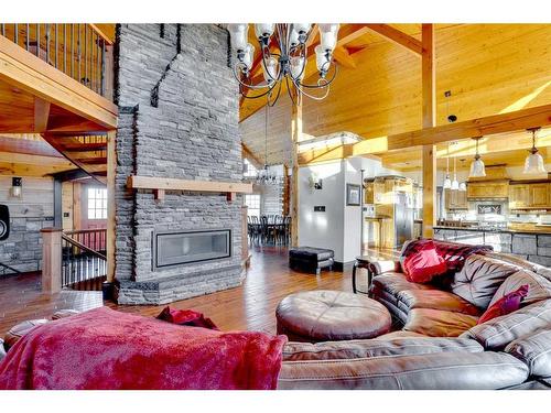 173 Sommer Way, Saprae Creek, AB - Indoor Photo Showing Living Room With Fireplace