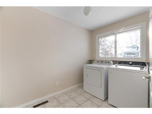 55 Fitzsimmons Avenue, Fort Mcmurray, AB - Indoor Photo Showing Laundry Room