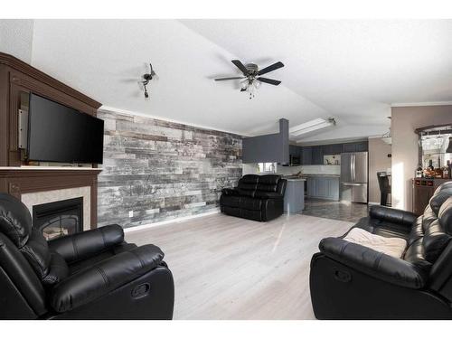 120 Hunter Street, Fort Mcmurray, AB - Indoor Photo Showing Living Room With Fireplace