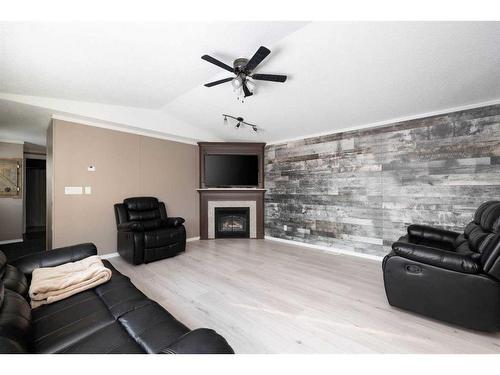 120 Hunter Street, Fort Mcmurray, AB - Indoor Photo Showing Living Room With Fireplace