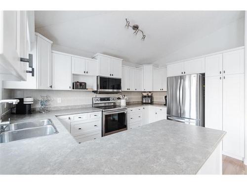 104 Swanson Crescent, Fort Mcmurray, AB - Indoor Photo Showing Kitchen With Double Sink