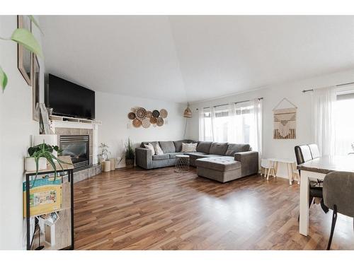 104 Swanson Crescent, Fort Mcmurray, AB - Indoor Photo Showing Living Room With Fireplace