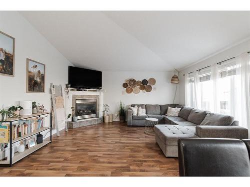 104 Swanson Crescent, Fort Mcmurray, AB - Indoor Photo Showing Living Room With Fireplace