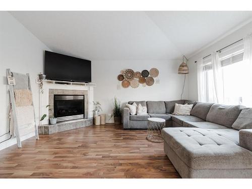 104 Swanson Crescent, Fort Mcmurray, AB - Indoor Photo Showing Living Room With Fireplace