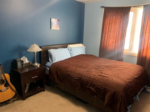 10016 102 Avenue, Lac La Biche, AB - Indoor Photo Showing Bedroom