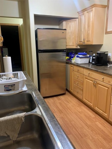 10016 102 Avenue, Lac La Biche, AB - Indoor Photo Showing Kitchen With Double Sink