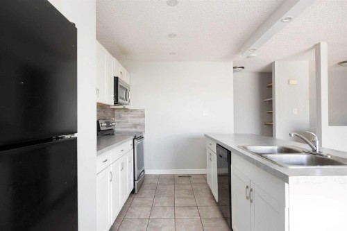 357 Ross Haven Drive, Fort Mcmurray, AB - Indoor Photo Showing Kitchen With Double Sink