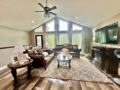 318 15156 Old Trail, Lac La Biche, AB - Indoor Photo Showing Living Room With Fireplace