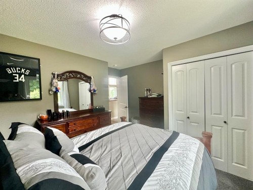 318 15156 Old Trail, Lac La Biche, AB - Indoor Photo Showing Bedroom