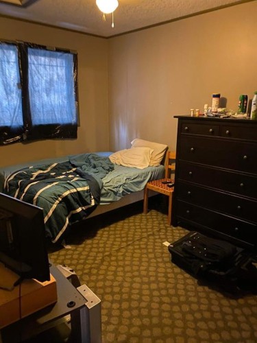 124 Singer Drive, Anzac, AB - Indoor Photo Showing Bedroom