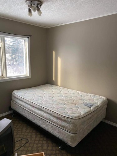 124 Singer Drive, Anzac, AB - Indoor Photo Showing Bedroom