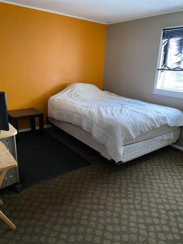 124 Singer Drive, Anzac, AB - Indoor Photo Showing Bedroom