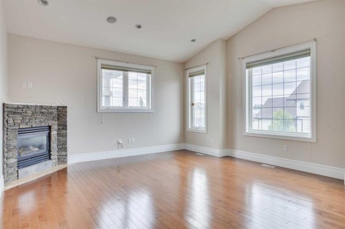 404 Killdeer Way, Fort Mcmurray, AB - Indoor Photo Showing Living Room With Fireplace