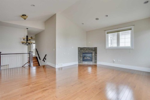 404 Killdeer Way, Fort Mcmurray, AB - Indoor Photo Showing Living Room With Fireplace