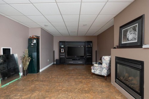 549 Walnut Crescent, Fort Mcmurray, AB - Indoor Photo Showing Living Room With Fireplace