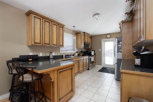 549 Walnut Crescent, Fort Mcmurray, AB - Indoor Photo Showing Kitchen With Double Sink