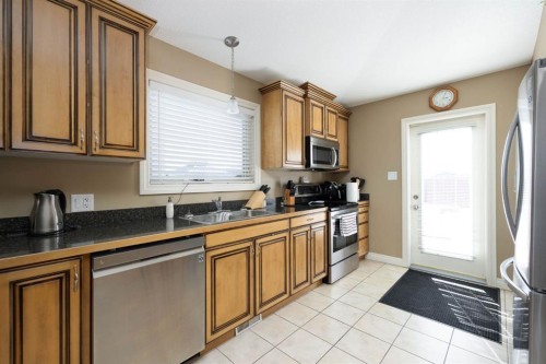 549 Walnut Crescent, Fort Mcmurray, AB - Indoor Photo Showing Kitchen With Double Sink