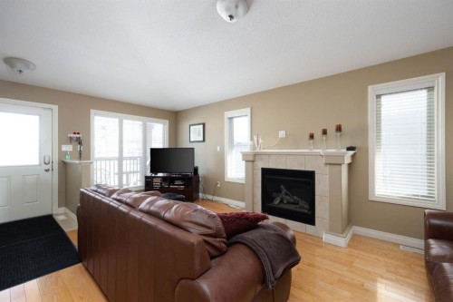 549 Walnut Crescent, Fort Mcmurray, AB - Indoor Photo Showing Living Room With Fireplace
