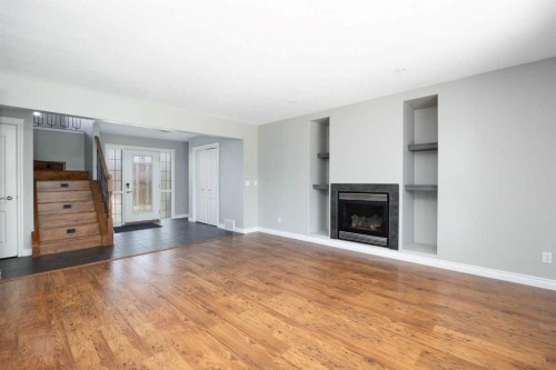 103 Rattlepan Creek Crescent, Fort Mcmurray, AB - Indoor Photo Showing Living Room With Fireplace