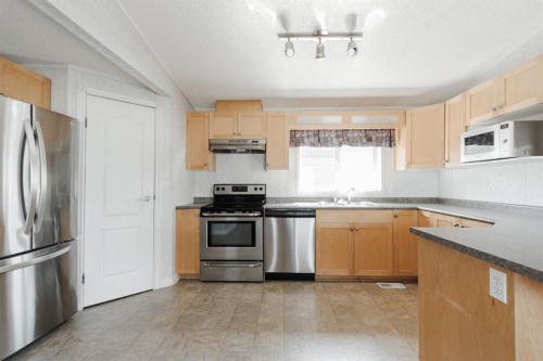 116 Balsam Way, Fort Mcmurray, AB - Indoor Photo Showing Kitchen With Stainless Steel Kitchen