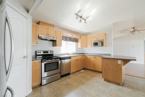 116 Balsam Way, Fort Mcmurray, AB - Indoor Photo Showing Kitchen With Stainless Steel Kitchen