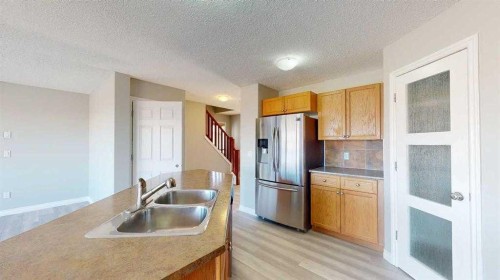 334 Grosbeak Way, Fort Mcmurray, AB - Indoor Photo Showing Kitchen With Double Sink