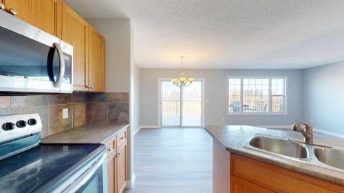 334 Grosbeak Way, Fort Mcmurray, AB - Indoor Photo Showing Kitchen With Double Sink