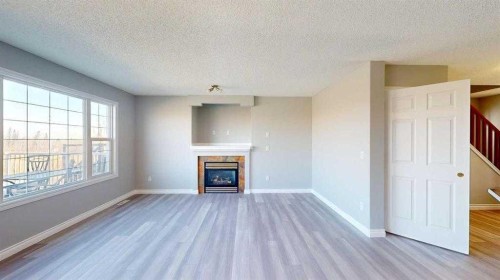334 Grosbeak Way, Fort Mcmurray, AB - Indoor Photo Showing Living Room With Fireplace