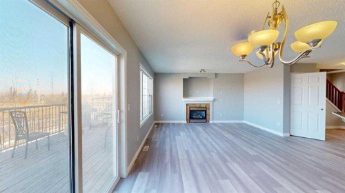 334 Grosbeak Way, Fort Mcmurray, AB - Indoor Photo Showing Other Room With Fireplace
