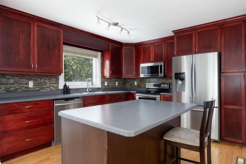 145 Dundas Road, Fort Mcmurray, AB - Indoor Photo Showing Kitchen With Stainless Steel Kitchen