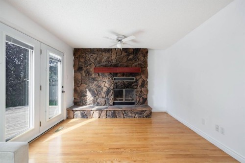 145 Dundas Road, Fort Mcmurray, AB - Indoor Photo Showing Living Room With Fireplace